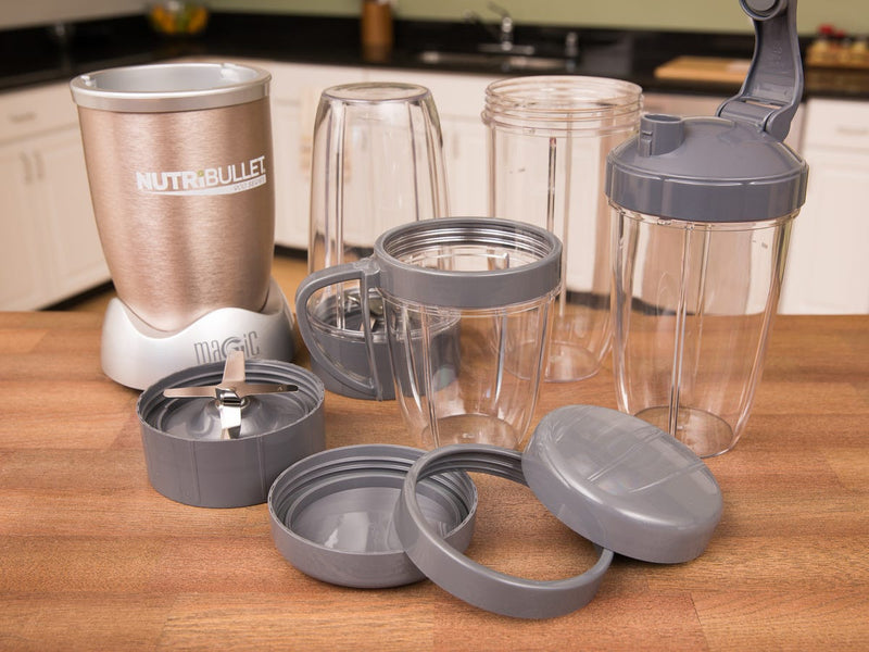 NutriBullet NB907CP Pro 900-Watt Hi-Speed Blender/Mixer Twist and Blend 9-Piece Set